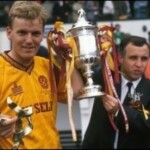 Stevie Kirk and Tommy McLean pose with the trophy.